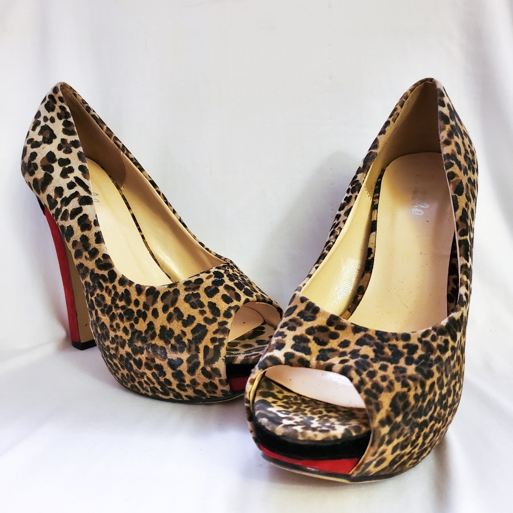 Dazzle peep toe animal print platform heel…